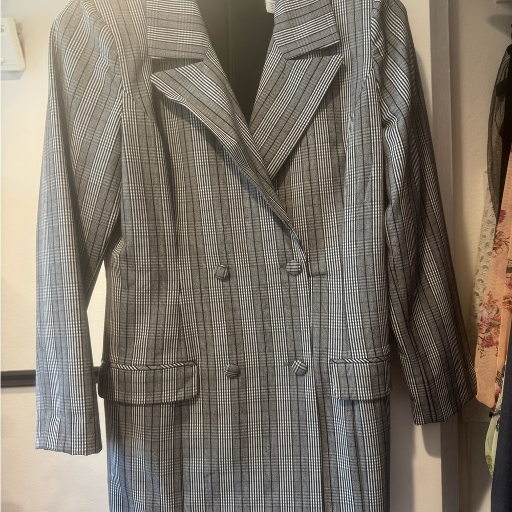 Hutch Black and White Checkered Long Sleeve romper.
Skort style